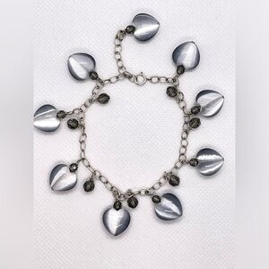 Beautiful silver tone shimmery heart charm bracelet w jewel beads. Extends 8.5”!